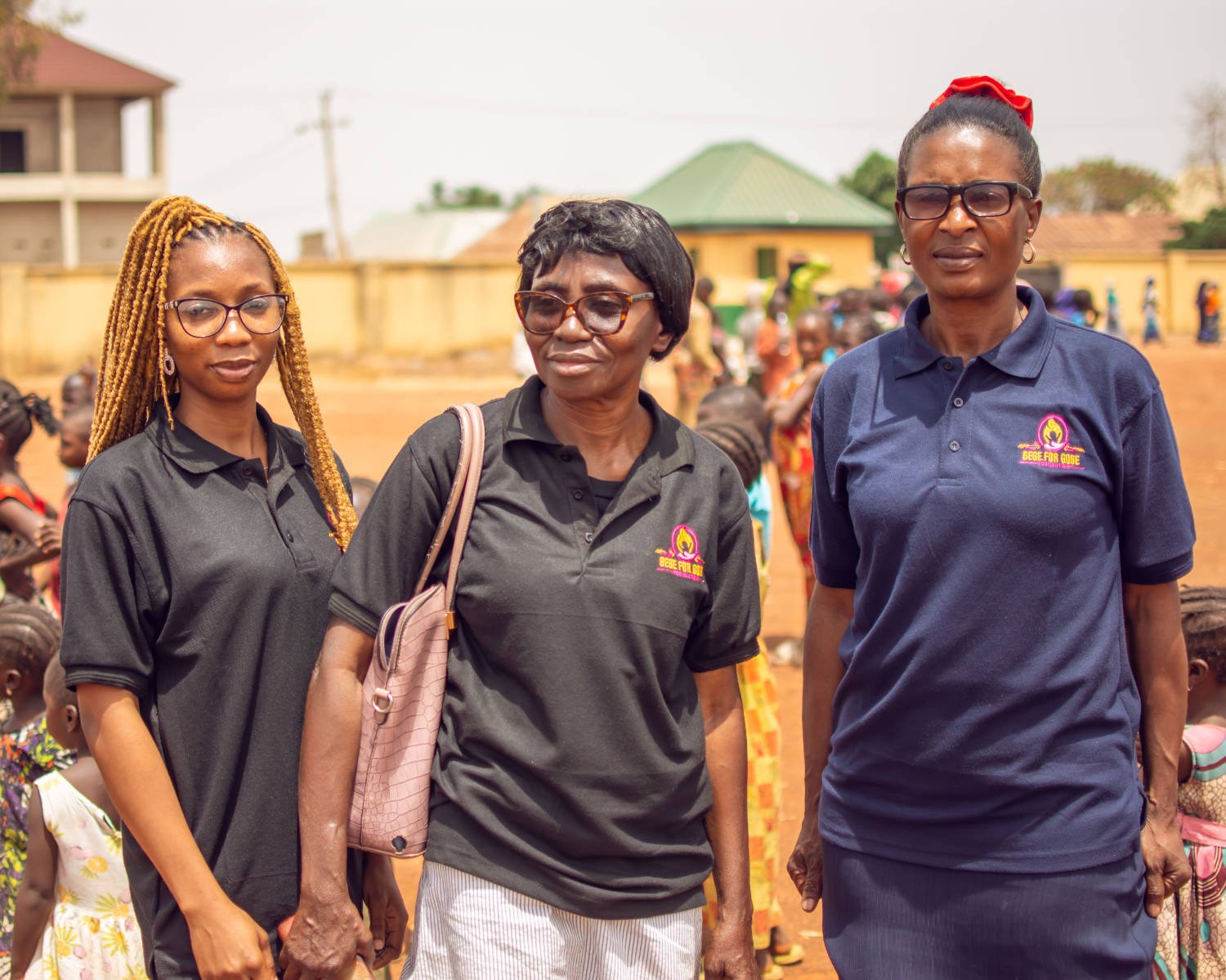 Three missionary women at an IDP camp.