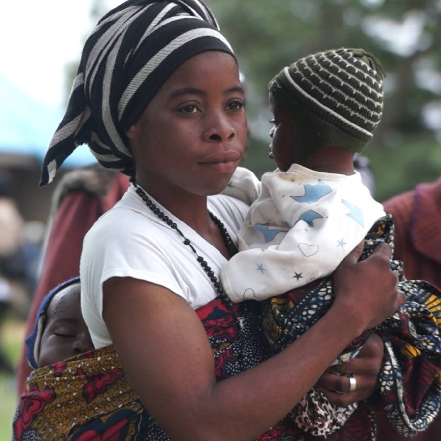 Widow and babies at Widow's Conference