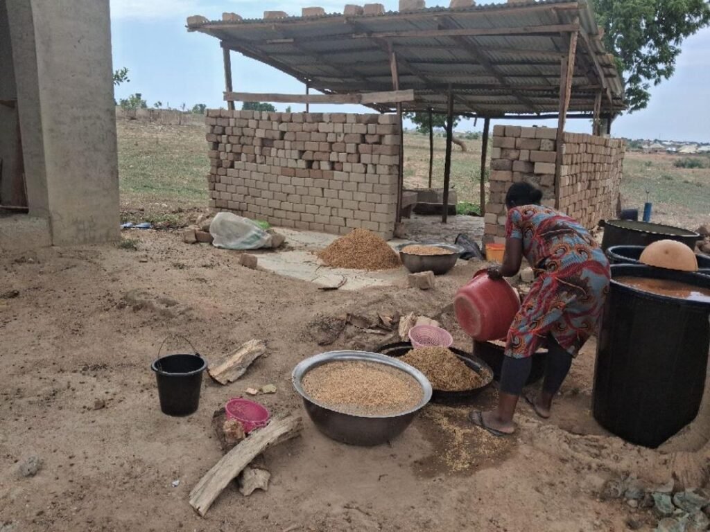 Processing rice at Kwali Farm